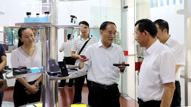 市委常委、市委統戰部部長歐陽鋒調研炬神電子